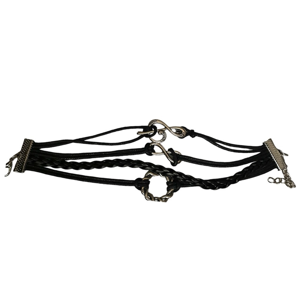 Brand New in Package corded bracelet cute charms. Each one come with happies